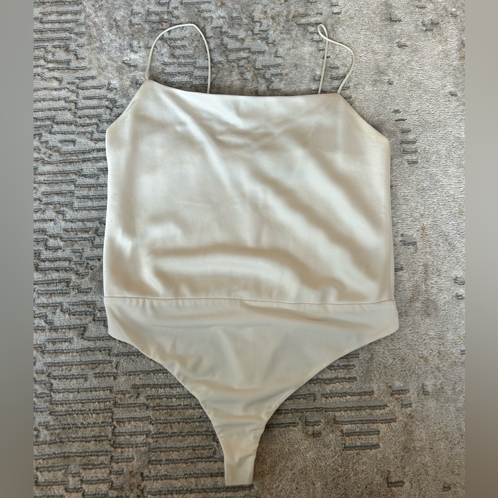 Alice + Olivia satin white tank bodysuit. Size large - minor visible wear